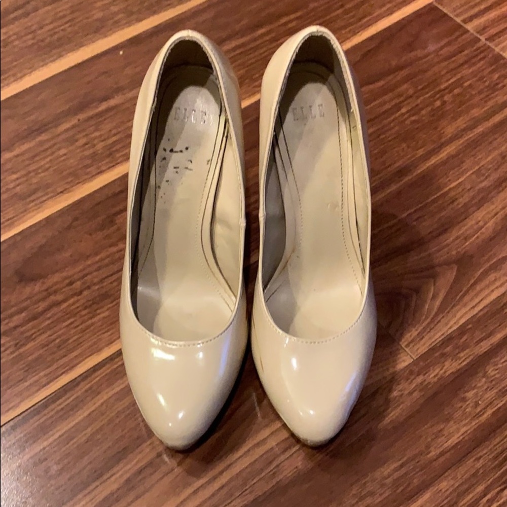 Cream closed toed shoes